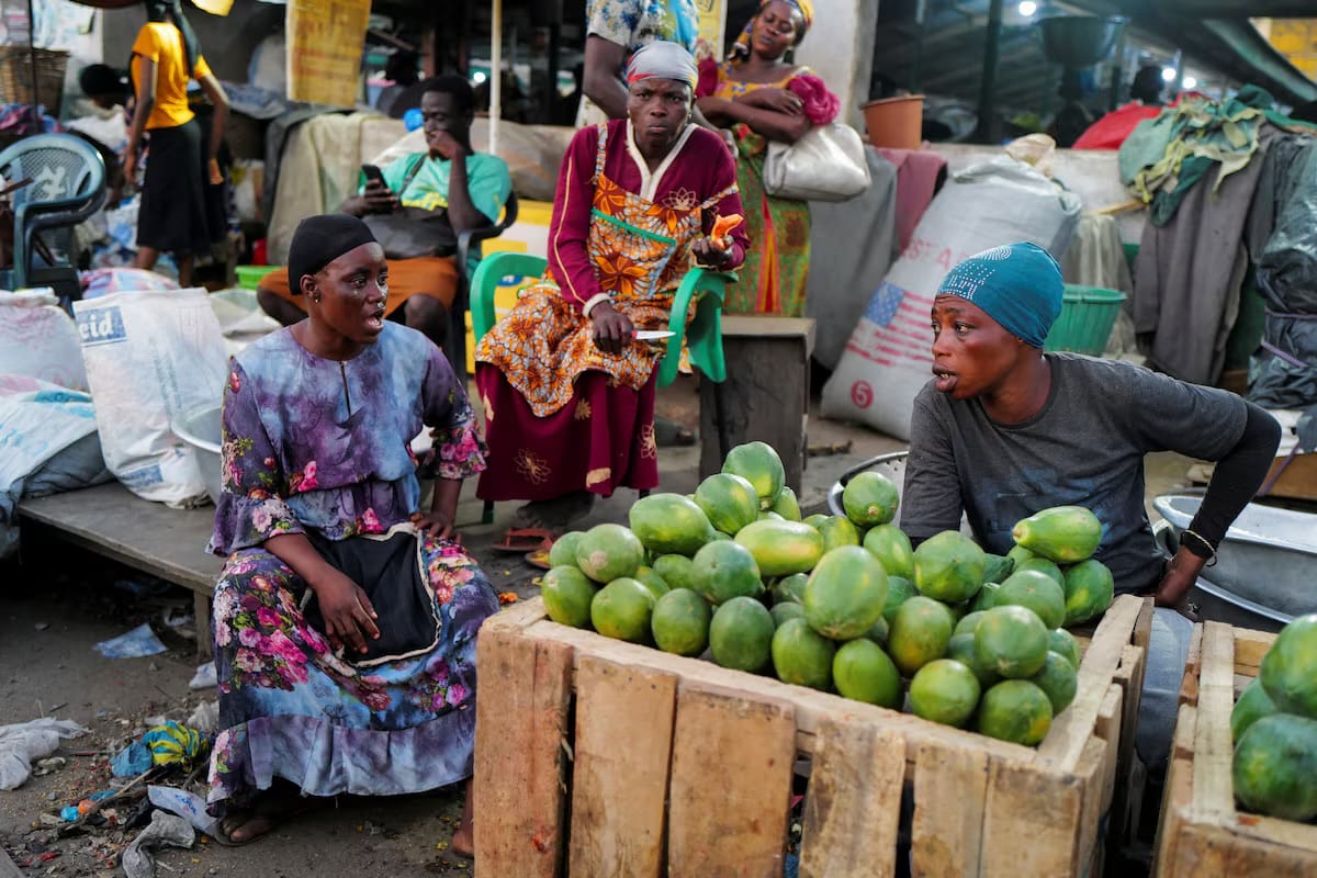 Market women interact at the Agbogbloshie market in Accra, Ghana.
